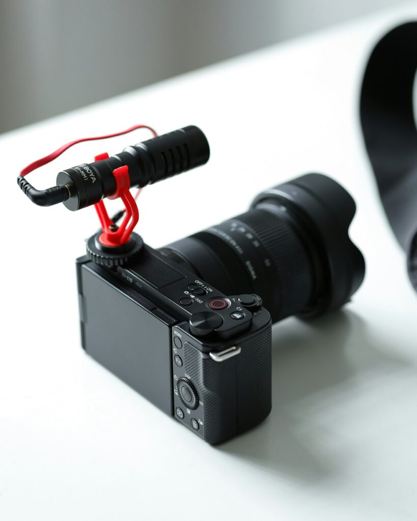 Sony ZV-E10 camera with shotgun microphone mounted on hotshoe for YouTube